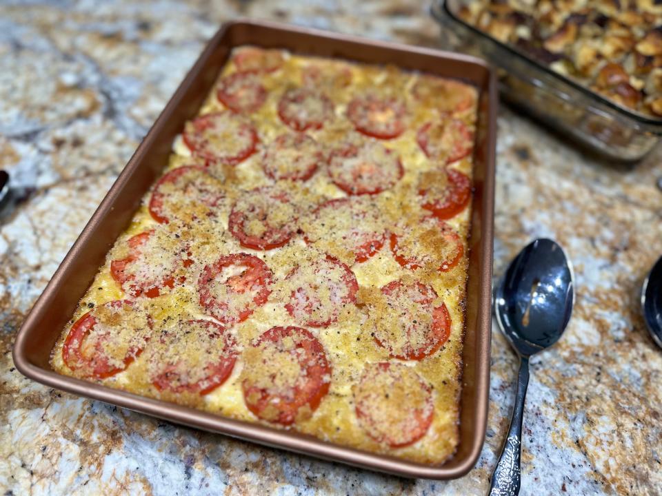 A tray of macaroni and cheese topped with bread crumbs