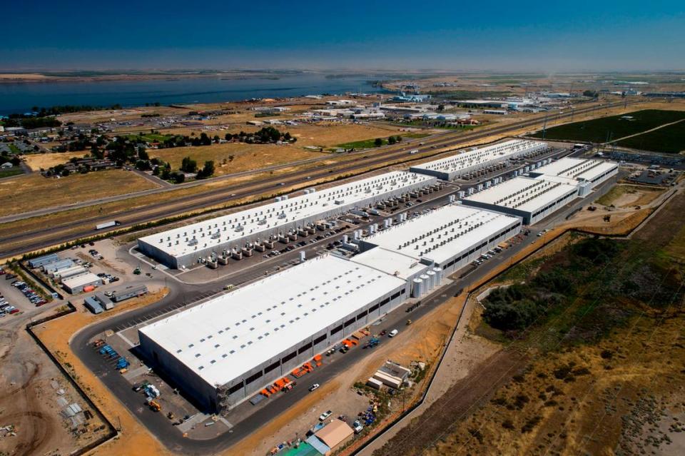 Amazon Web Services secured property tax breaks reported worth $1 billion to add five data centers in Boardman, about 50 miles southwest of Kennewick.