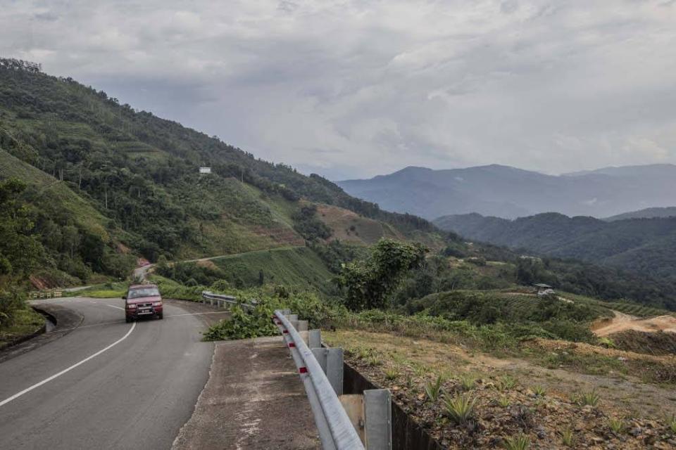 A hill view from Jalan Kiulu Logkou Lama in Tamparuli, Sabah, September 19, 2020. Access roads are essential for smaller villages that need to be able to move goods such as farm produce, the catch of the day or fresh meat in order to make a living. — Picture by Firdaus Latif