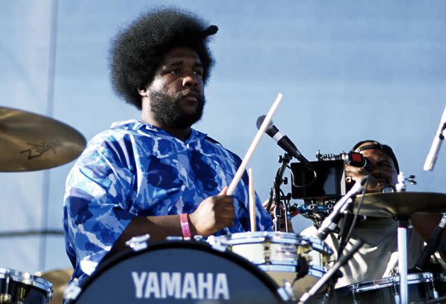 <p>Tim Mosenfelder/getty</p> The Roots at Coachella 2001