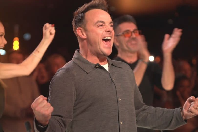 Ant after pressing the Golden Buzzer for Britain's Got Talent's Ssaulabi Performance Troupe -Credit:ITV