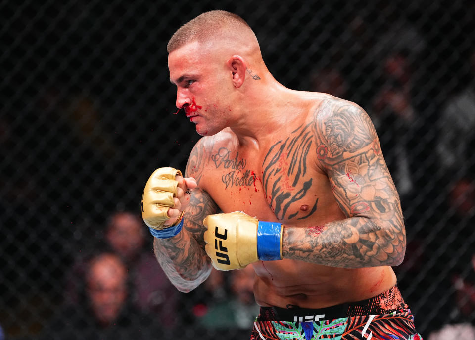 NEWARK, NEW JERSEY - JUNE 01: Dustin Poirier battles Islam Makhachev of Russia in the UFC lightweight championship fight during the UFC 302 event at Prudential Center on June 01, 2024 in Newark, New Jersey. (Photo by Jeff Bottari/Zuffa LLC via Getty Images)