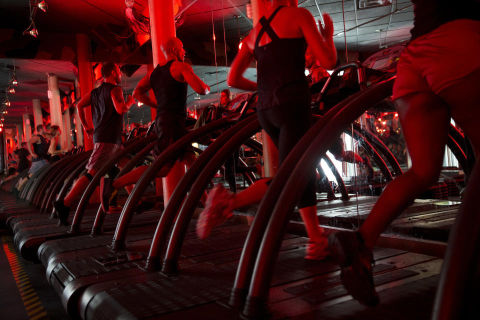 Clients exercise in a class at a Barryâ€™s Bootcamp studio in New York.