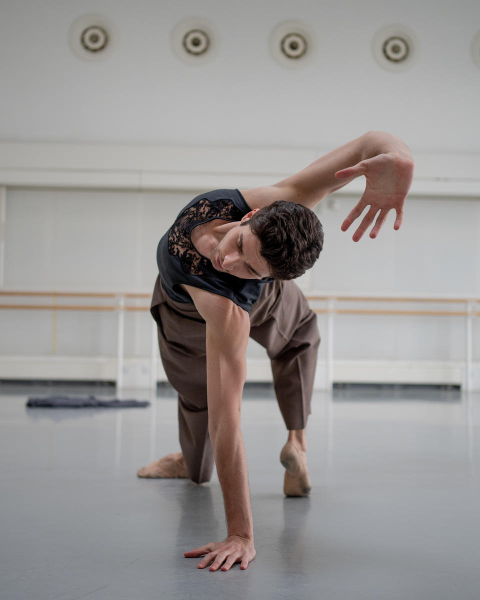 Reece Clarke wearing the costume designed by Kim Jones for Dior men in rehearsals for the Charleston Festival performance