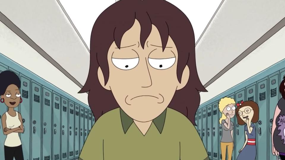 A boy with long hair walks down a row of high school lockers looking sad while other students laugh at him on Rick and Morty