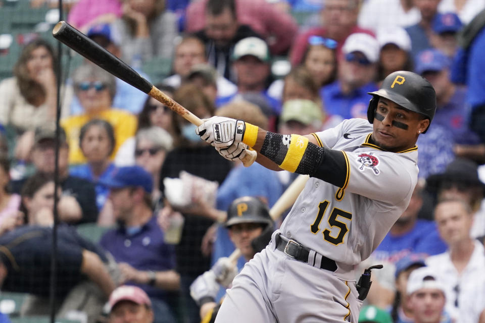 Pittsburgh Pirates' Wilmer Difo hits a two-run single during the fifth inning of a baseball game against the Chicago Cubs in Chicago, Saturday, Sept. 4, 2021. (AP Photo/Nam Y. Huh)