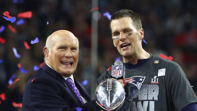 New England Patriots quarterback Tom Brady (L) and wide receiver Julian  Edelman celebrate after defeating the Atlanta Falcons in Super Bowl LI at  NRG Stadium in Houston on February 5, 2017. The