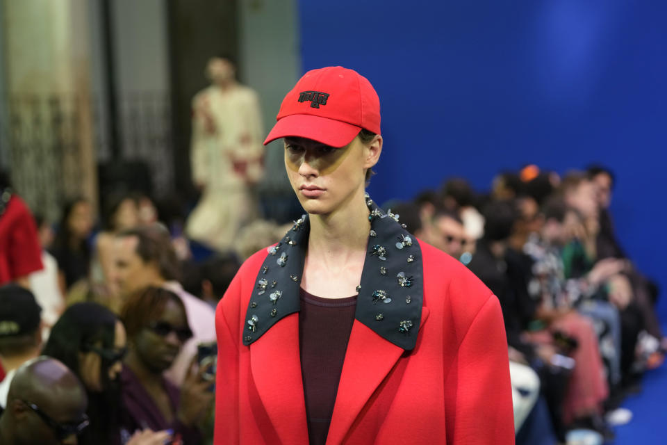 A model wears a creation as part of the Dhruv Kapoor men's and women's Spring Summer 2024 collection, unveiled during the Fashion Week in Milan, Italy, Monday, June 19, 2023. (AP Photo/Antonio Calanni)