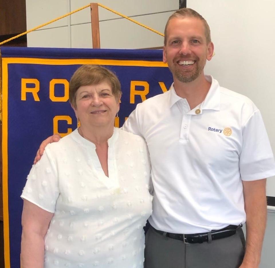 Vocational Service Award winner Ryan Mills, right, is pictured with Sue Cherney of the Rotary Club’s Awards Committee. Cherney nominated Mills for the honor.
