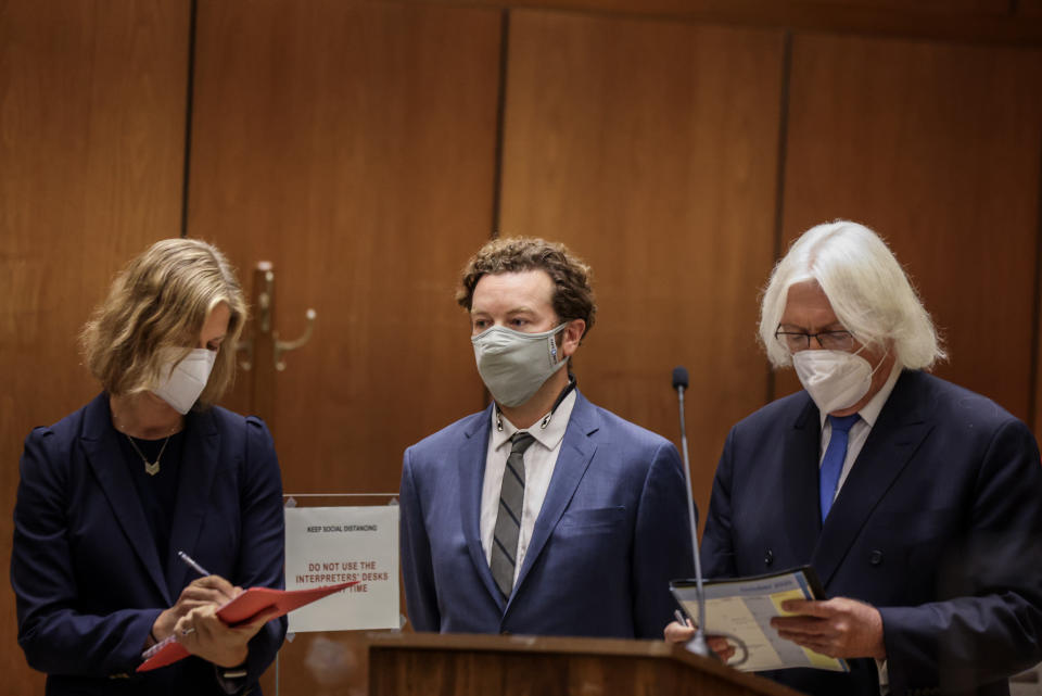 Image: Actor Danny Masterson stands with his lawyers as he is arraigned on three rape charges  on Sept. 18, 2020 in Los Angeles, Calif. (Lucy Nicholson / AFP via Getty Images)