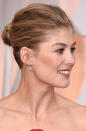 "Gone Girl" star Rosamund Pike opted for a textured bun, created by Kylee Rae Heath. The stylist used a 3/4 inch and 1 inch curling iron to create texture throughout Pike’s hair before pulling back into a bun and finishing with lots of hairspray.