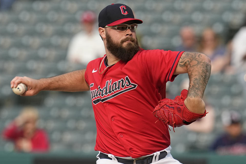 Cleveland Guardians' Hunter Gaddis pitches in the first inning of a baseball game against the Chicago White Sox, Monday, May 22, 2023, in Cleveland. (AP Photo/Sue Ogrocki)