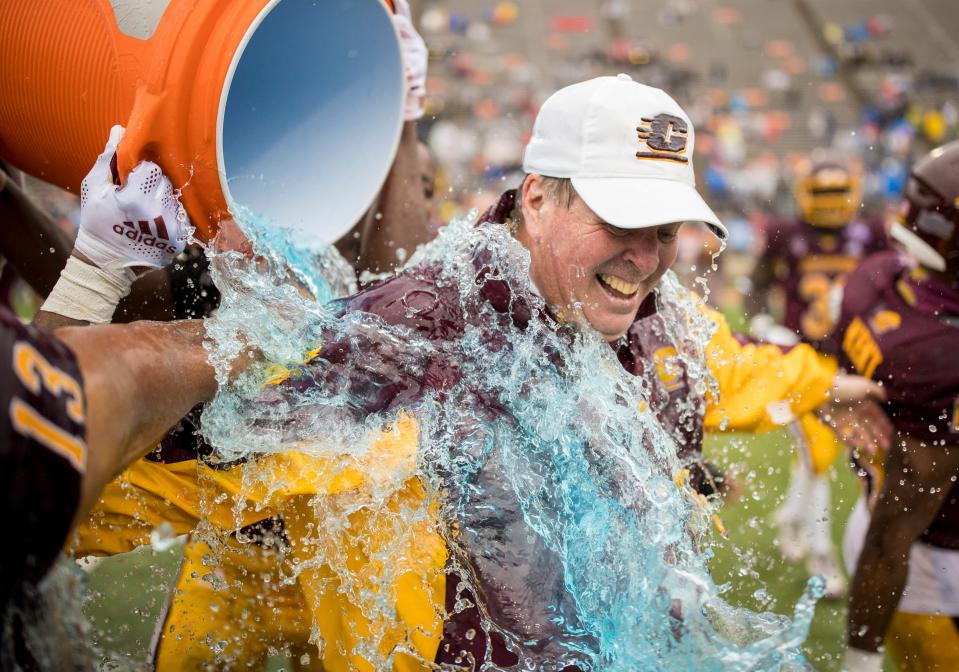 Dec 31, 2021; El Paso, Texas, USA; Central Michigan Chippewas head coach Jim McElwain is showered with Gatorade after defeating Washington State Cougars 24-21 in the 88th annual Tony the Tiger Sun Bowl football game at Sun Bowl Stadium. Mandatory Credit: Ivan Pierre Aguirre-USA TODAY Sports