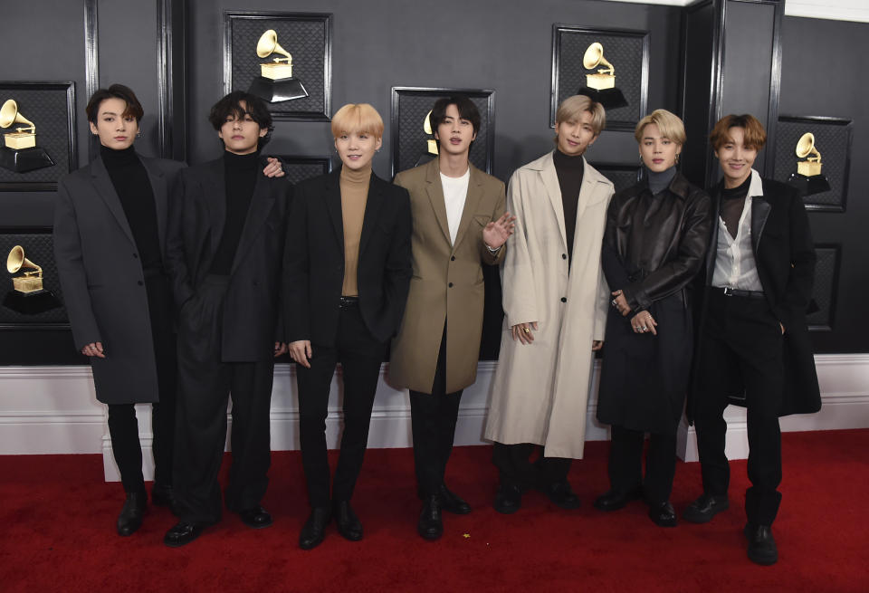 FILE - BTS arrives at the 62nd annual Grammy Awards in Los Angeles on Jan. 26, 2020. The K-pop band is nominated for a Grammy Award for best pop duo/group performance with “Dynamite," their first song to hit the No. 1 spot on the Billboard Hot 100 chart. (Photo by Jordan Strauss/Invision/AP, File)