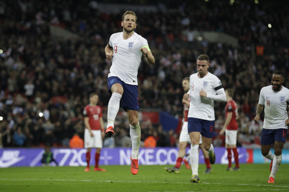 England's Harry Kane celebrates his sides second goal during the Euro 2020 group a qualifying soccer match between England and the Czech Republic at Wembley stadium in London, Friday March 22, 2019. (AP Photo/Matt Dunham)