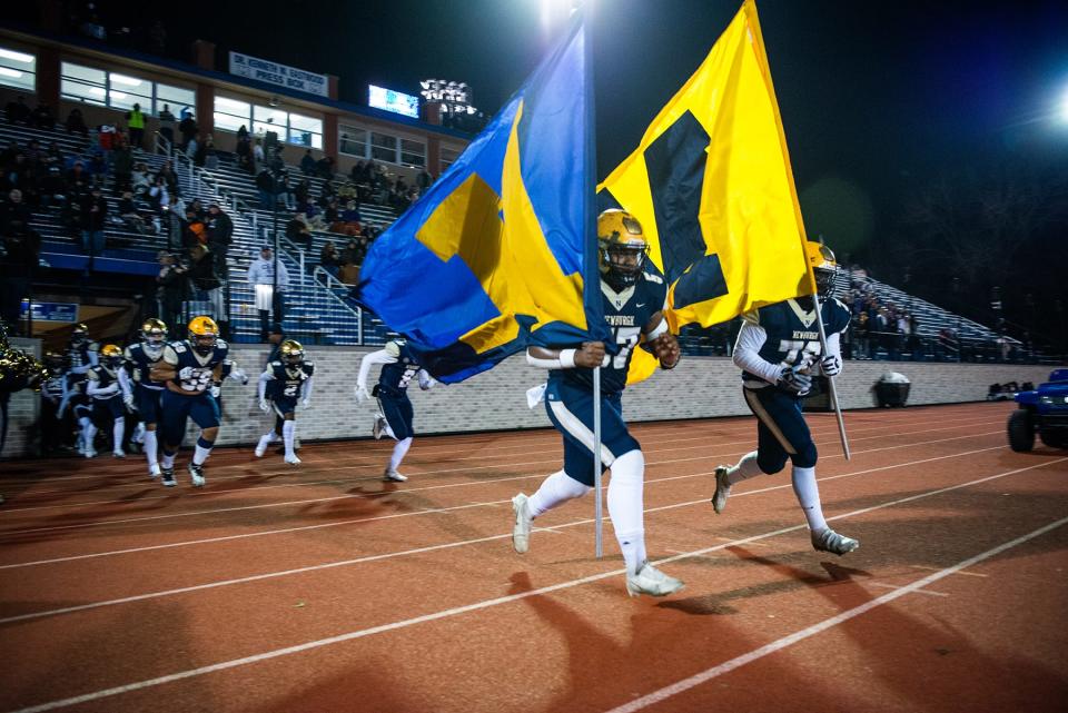 Newburgh takes the field during the NYSPHSAA Class AA semifinall football game in Middletown, NY on Saturday, November 26, 2022. Newburgh defeated Christian Brothers Academy. KELLY MARSH/FOR THE TIMES HERALD-RECORD