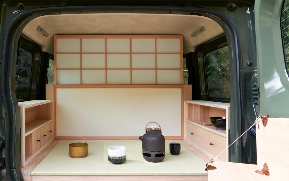 The immaculately designed room includes a traditional sliding paper screen known as shoji to separate the tea space from the rest of the car - ASANO Takeshi 