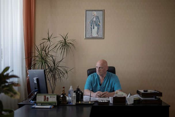 PHOTO: Doctor Ivan Tsyganok, 56, sits at his desk inside Pokrovsk maternity hospital, Donetsk region, eastern Ukraine, June 28, 2022. (Marko Djurica/Reuters)