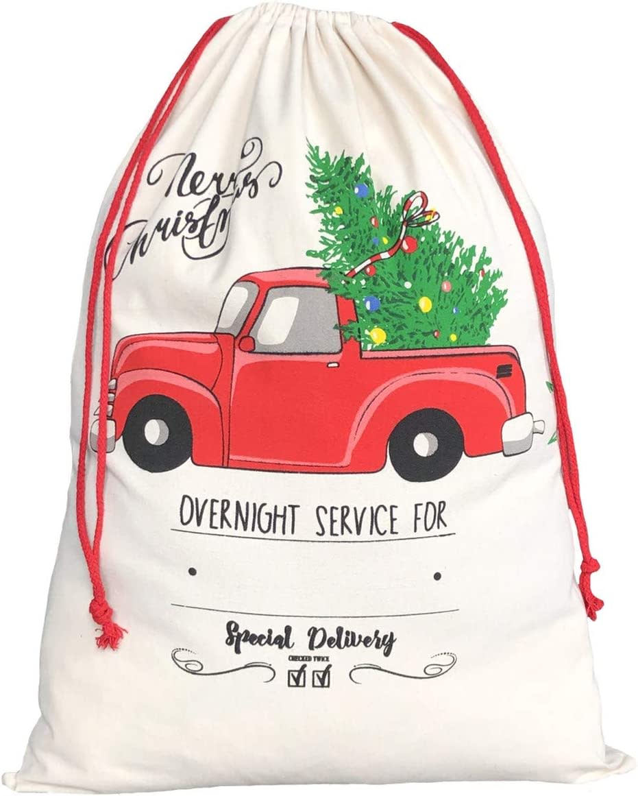 oversized chistmas gift sack with a truck carryiing a tree on front