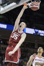 <p>Oklahoma forward Brady Manek (35) dunks the ball as Mississippi forward KJ Buffen, right, looks on during a first round men’s college basketball game in the NCAA Tournament Friday, March 22, 2019, in Columbia, S.C. (AP Photo/Sean Rayford) </p>