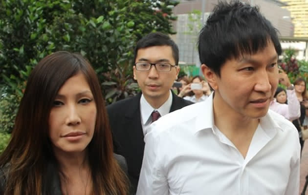 Kong Hee and wife, Sun Ho, heads to court for City Harvest Church trial. (Yahoo Singapore)