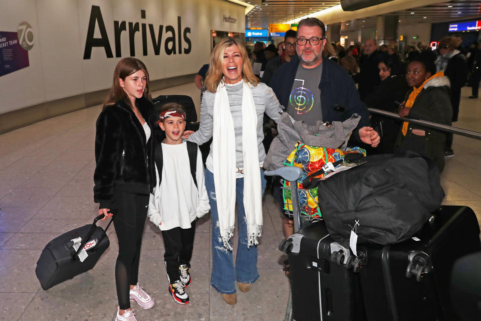 Kate Garraway, alongside her husband Derek Draper and two children Darcey, 13, and Bill, 10, arrives back at Heathrow Airport after the 2019 series of I'm A Celebrity ... Get Me Out Of Here! (Photo by Steve Parsons/PA Images via Getty Images)