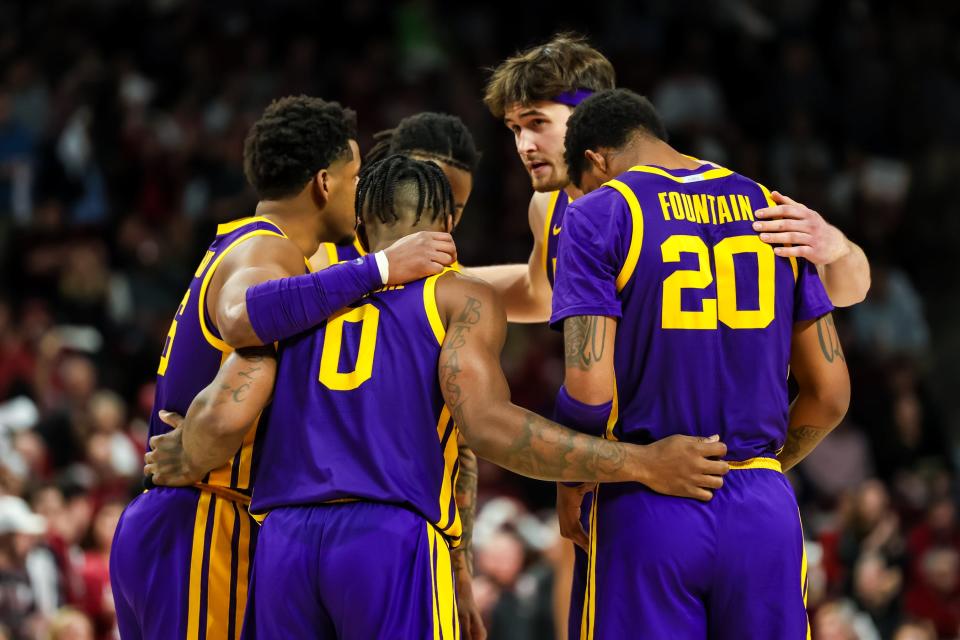 Feb 17, 2024; Columbia, South Carolina, USA; LSU Tigers players huddle against the South Carolina Gamecocks in the first half at Colonial Life Arena. Mandatory Credit: Jeff Blake-USA TODAY Sports
