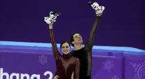 <p>FEBRUARY 20: Tessa Virtue and Scott Moir of Canada celebrate the gold medal during the venue victory ceremony following the Figure Skating Ice Dance Free Dance program on day eleven of the PyeongChang 2018 Winter Olympic Games at Gangneung Ice Arena on February 20, 2018 in Gangneung, South Korea. (Photo by Jean Catuffe/Getty Images) </p>