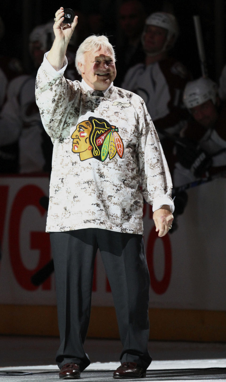 FILE - Former Chicago Blackhawks star Bobby Hull waves to fans before the NHL hockey game between the Blackhawks and the Colorado Avalanche in Chicago, Nov. 11, 2009. Hull, a Hall of Fame forward who helped the Blackhawks win the 1961 Stanley Cup Final, has died. He was 84. The Blackhawks and the NHL Alumni Association announced the death of the two-time NHL MVP on Monday, Jan. 30, 2023. (AP Photo/Nam Y. Huh, file)