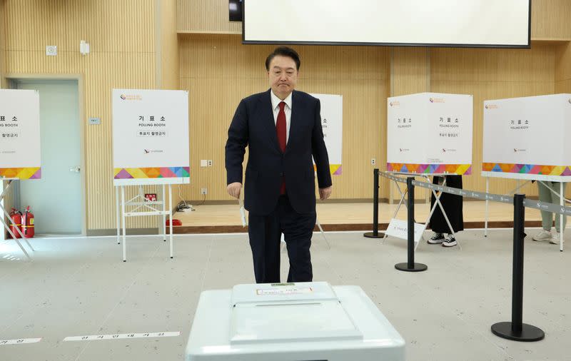 South Korean President Yoon Suk Yeol casts his early vote for 22nd parliamentary election, in Busan