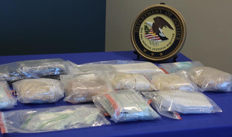 Some of the drugs seized by law enforcement in Delaware.  Two men were arrested for selling fake Oxycodone pills, heroin, cocaine and cash.