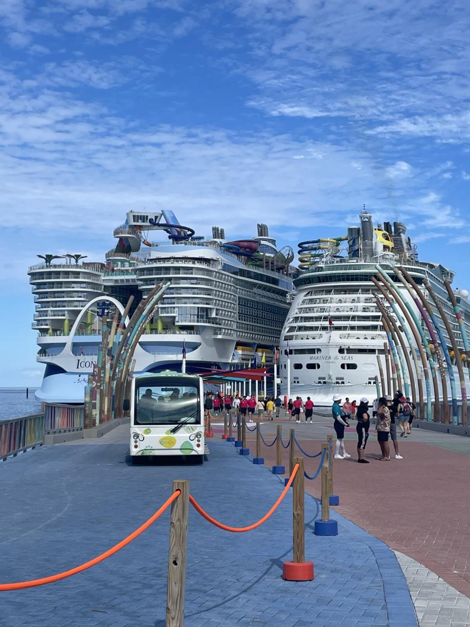 The Icon of the Seas and one of its (smaller) sister ships on CocoCay, Royal Caribbean’s private island in the Bahamas. (Andrea Sachs/The Washington Post)