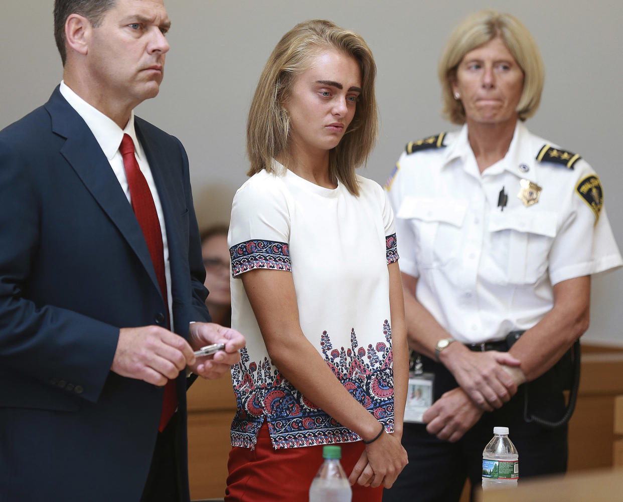  In this Aug. 3, 2017 file photo Michelle Carter, center, listens to her sentencing for involuntary manslaughter. (Matt West / The Boston Herald via AP)