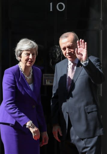 Britain's Prime Minister Theresa May greets Turkey's President Recep Tayyip Erdogan outside 10 Downing Street on May 15, 2018