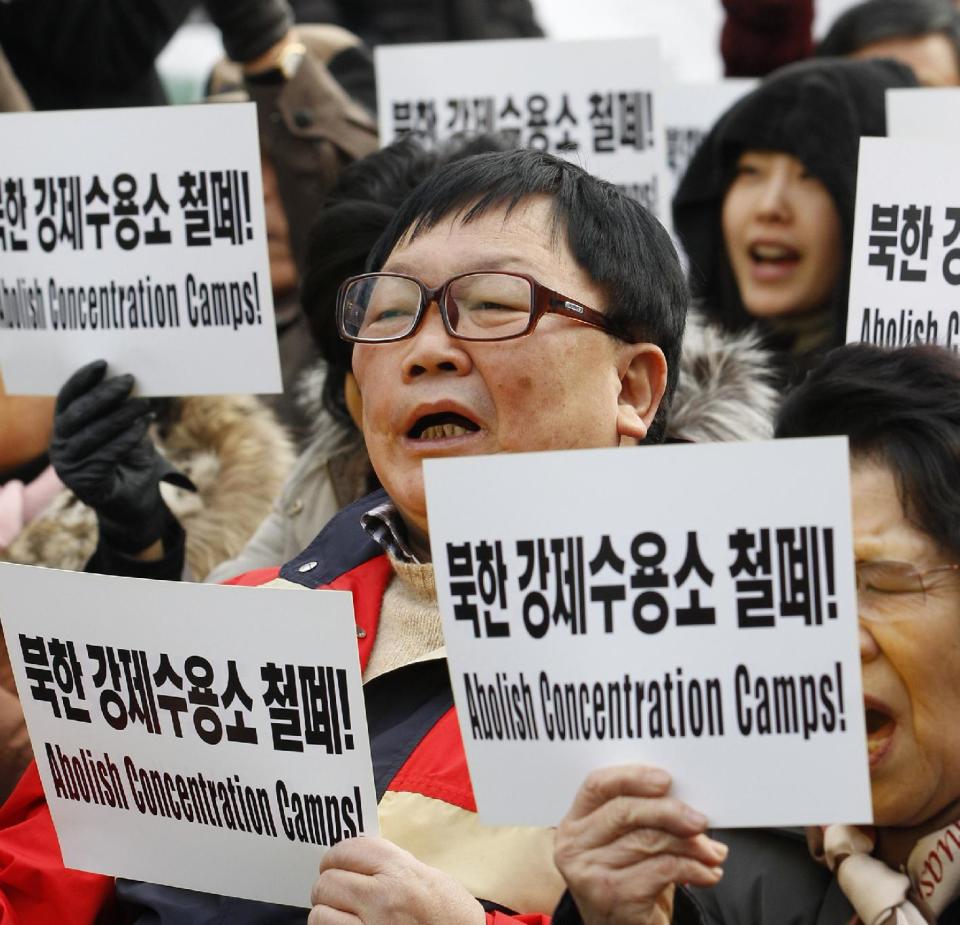 In this photo taken on Dec. 9, 2011, Oh Kil-nam, a South Korean, who defected with his family to the communist North after being lured by promises of an important job and free medical treatment for his ill wife, and then later fled the country leaving his family behind, shouts slogans during a rally denouncing North Korea's alleged genocide and crimes against humanity in Seoul, South Korea. (AP Photo/Lee Jin-man)