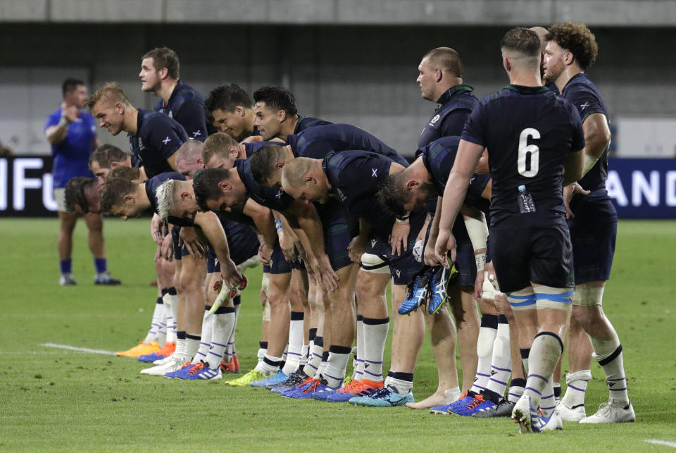 Scotland players bow to the crowd following their Rugby World Cup Pool A game at Kobe Misaki Stadium between Scotland and Samoa in Kobe City, Japan, Monday, Sept. 30, 2019. Scotland defeated Samoa 34-0. (AP Photo/Aaron Favila)