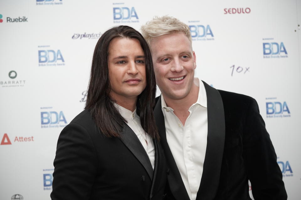 Ollie Locke (Left) with his husband Gareth Locke arrives at the Burberry British Diversity Awards at the De Vere Grand Connaught Rooms in London. Picture date: Thursday March 10, 2022. (Photo by Yui Mok/PA Images via Getty Images)