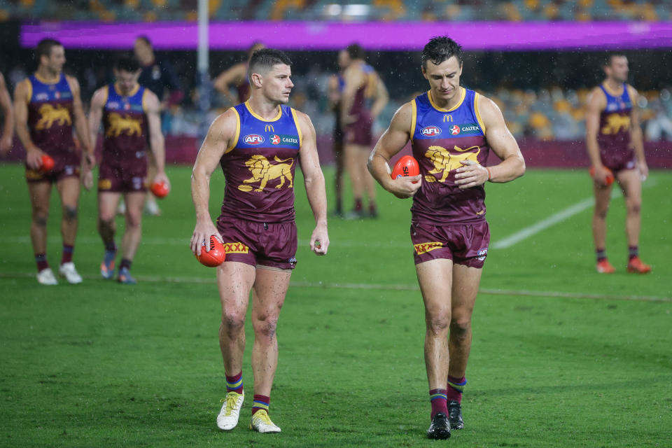 BRISBANE, AUSTRALIA - APRIL 20: Brisbane Lions are seen following the 2024 AFL Round 06 match between the Brisbane Lions and the Geelong Cats at The Gabba on April 20, 2024 in BRISBANE, Australia. (Photo by Russell Freeman/AFL Photos via Getty Images)