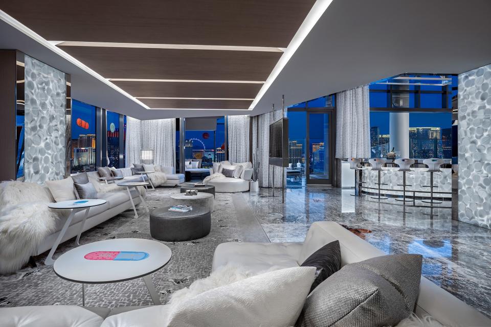 The living room in the Palms’ Empathy Suite, designed by and featuring the works of Damien Hirst.