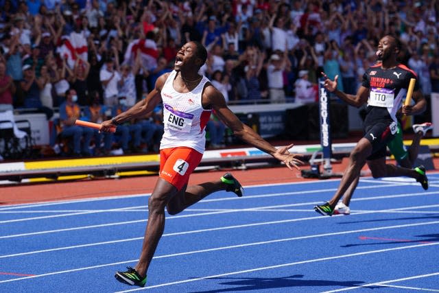 Ojie Edoburunat celebrates after anchoring England to victory in the men's 4x100m relay (Martin Rickett/PA)