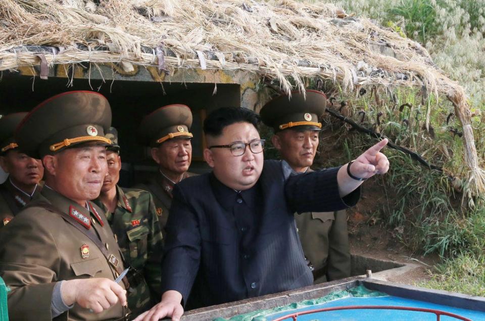 North Korean leader Kim Jong Un inspecting defense forces.