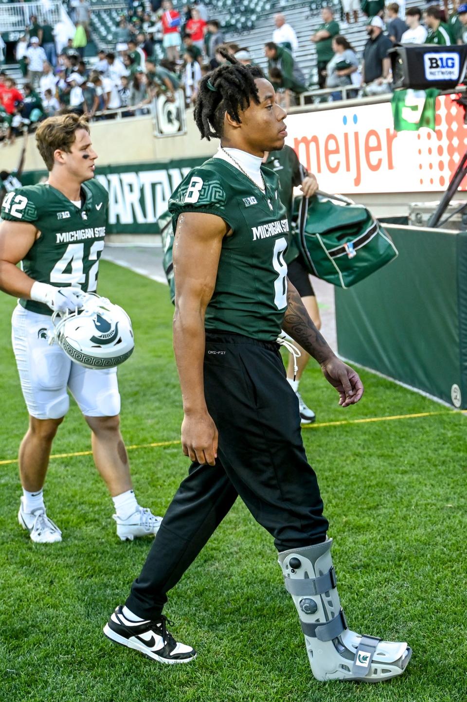 Michigan State's Jalen Berger leaves the field after the Spartans beat Richmond on Saturday, Sept. 9, 2023, at Spartan Stadium in East Lansing. Berger was injured in the game.