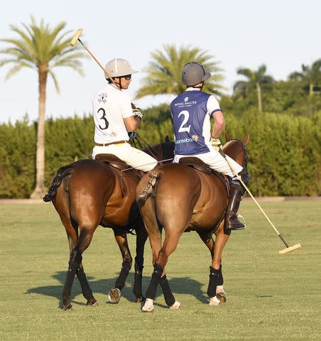 <p>Jason Koerner/Getty Images</p> Nacho Figueras and Prince Harry during the Royal Salute Polo Challenge benefitting Sentebale at the Grand Champions Polo Club in Florida on April 12, 2024.