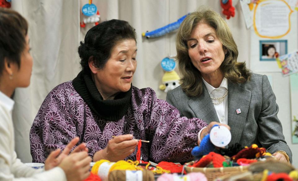 Kennedy chats with a tsunami survivors at Nakasemachi temporary housing complex in Minamisanriku