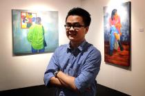 Kenny Teng, who runs the G13 Gallery, says younger people are showing interest in collecting artwork. – The Malaysian Insider pic by Afif Abd Halim, December 21, 2014.