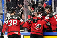 Canada's Matt Barzal celebrates his goal with teammates during a match between the Czech Republic and Canada in the semifinals of the Hockey World Championships, in Tampere, Finland, Saturday, May 28, 2022. (AP Photo/Martin Meissner)