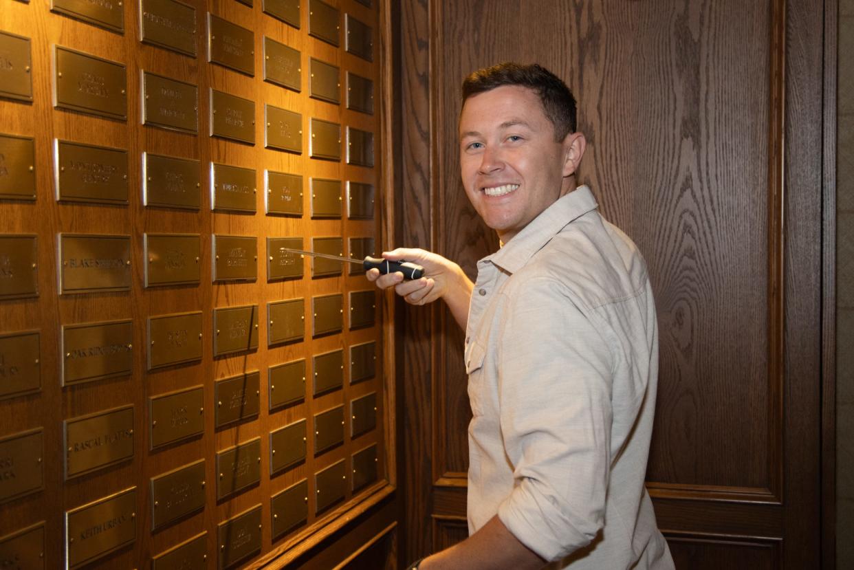 Scotty McCreery installs his Grand Ole Opry membership plaque, April 20, 2024