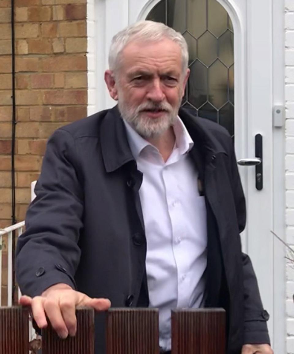 Jeremy Corbyn leaving his home on Monday (PA)