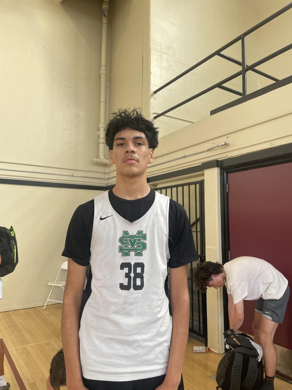 Daniel Huerta of St. Mary's basketball poses for a photo after a game at Edison High School for the Modesto Christian Summer Classic.