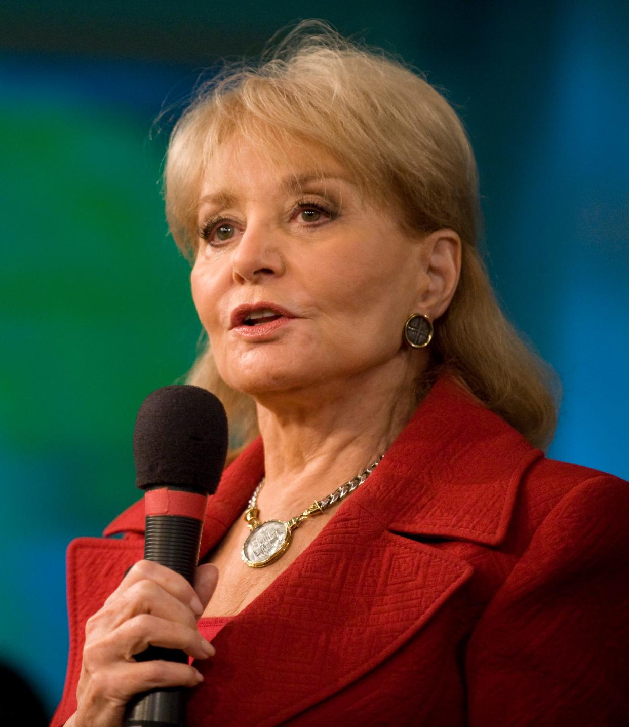 Barbara Walters talks to the studio audience during a commercial break during the first show of the 14th season of The View in 2010. Walters returned to the job after being off for several months for heart surgery. It was Walters' first live show since the heart trouble.